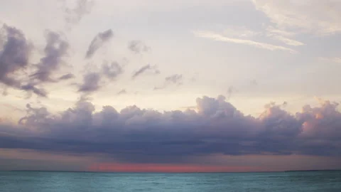 Timelapse with Sunset and Cumulus Clouds Flying High in a Beautiful Blue Sky Stock Footage 201329553