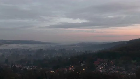 Timelapse sunset and mist over a town Stock Footage 144826066