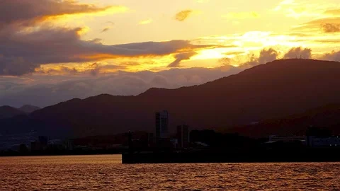 Timelapse Sunset and Night View of Hiroshima Cityscape with Moving Clouds,4K 库存影片 345063024