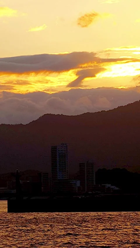 Timelapse Sunset and Night View of Hiroshima Cityscape with Moving Clouds,02 Video stock 345063028