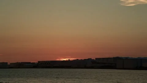Timelapse of sunset and twilight at river at Osaka, Japan Stock Footage 313631294
