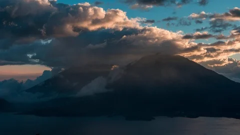 Timelapse of sunset in Atitlan lake,  volcano Toliman and Atitlan. Stock Footage 114709551