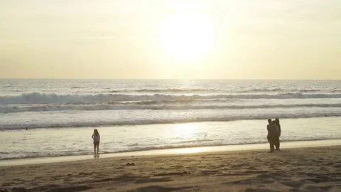 Timelapse sunset on the beach in Bali. silhouetted people Stock Footage 83699282