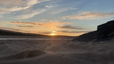 Timelapse of a sunset on the beach Stock Footage 239656143