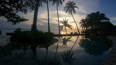 Timelapse - Sunset at the beach - mirror from pool Stock Footage 194444167