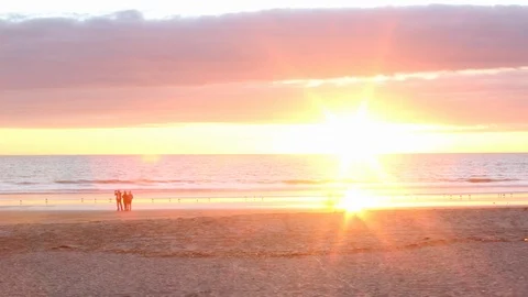 Timelapse of a Sunset at the Beach with People Stock Footage 111492608