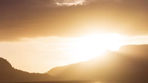 Timelapse - Sunset behind a mountain with colour explosion 4K60 Stock Footage 268792201