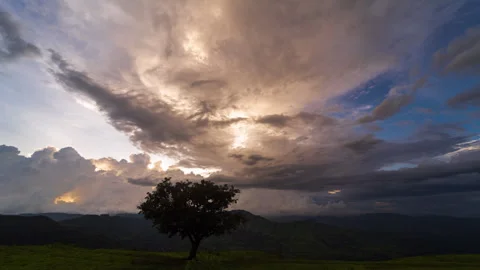Timelapse - Sunset behind a mountain with colour explosion 4K60 Stock Footage 270143258