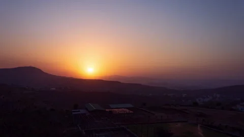 Timelapse - Sunset behind a mountain with colour explosion 4K60 Stock Footage 270430810