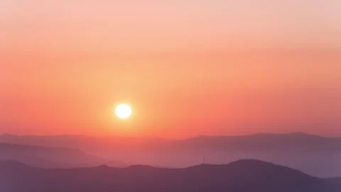 Timelapse - Sunset behind a mountain with colour explosion 4K60 Stock Footage 271017966