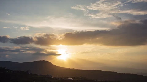 Timelapse - Sunset behind a mountain with colour explosion 4K60 Stock Footage 271019088