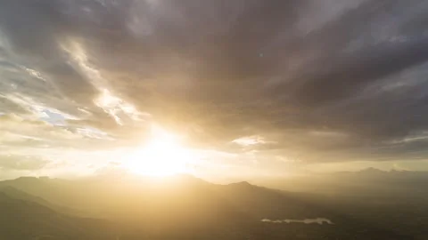 Timelapse - Sunset behind a mountain over a valley with colour explosion 4K60 Stock Footage 270140675