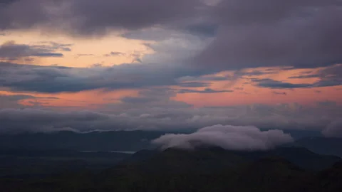 Timelapse - Sunset behind a mountains with clouds and colour explosion 4K60 Stock Footage 270083874