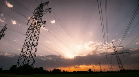 Timelapse of Sunset Behind Power Lines Stock Footage 45705645