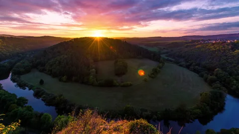 Timelapse of Sunset Behind River Loop [8K] Stock Footage 141069877