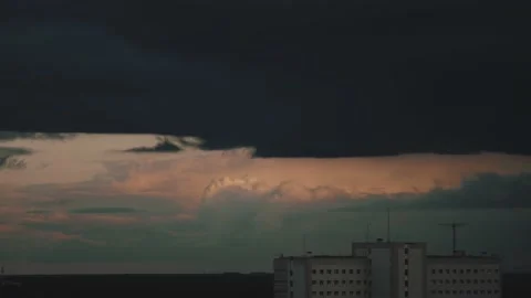 Timelapse at sunset, black clouds are gathering in the sky. Stock Footage