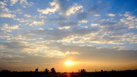 Timelapse of sunset with blue sky and clouds Stock Footage 78020549