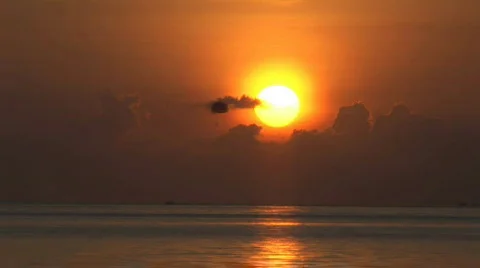Timelapse sunset with boat passing by Stock Footage 70965