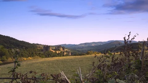 Timelapse of sunset with castle and clouds in burgundy Stock Footage 123536756