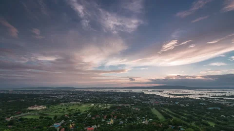 Timelapse Sunset cloud over Mandalay city at dusk with twilight sky Stock Footage 67757621
