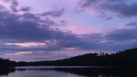 Timelapse sunset clouds at lake, midsummer Stock Footage 126008971