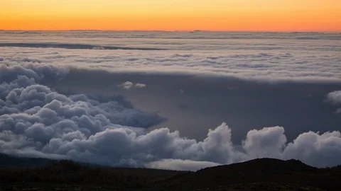 Timelapse of a sunset with clouds moving in the mountains volcano Teide Stock Footage 97595721