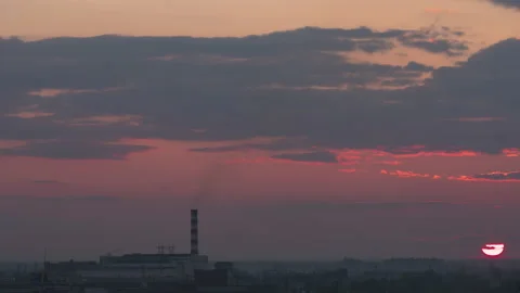 Timelapse, sunset clouds over the city Stock Footage 220694973