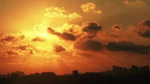 Timelapse sunset on the cloudy sky Stock Footage 97909181