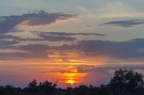 Timelapse of sunset on cloudy sky in nature Stock Footage 94495321