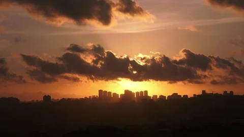 Timelapse sunset on the cloudy sky over city Stock Footage 94397305