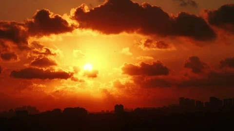 Timelapse sunset on the cloudy sky over city Stock Footage 97909164