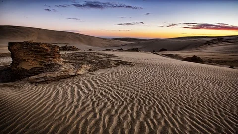 Timelapse of sunset of coast sand dunes Stock Footage 73843997