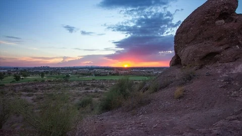 Timelapse of Sunset in Desert City Stock Footage 89591278