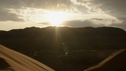 Timelapse of sunset on desert Stock Footage 106353457