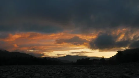 Timelapse sunset flying clouds and bright rays of the sun Stock Footage 165236781