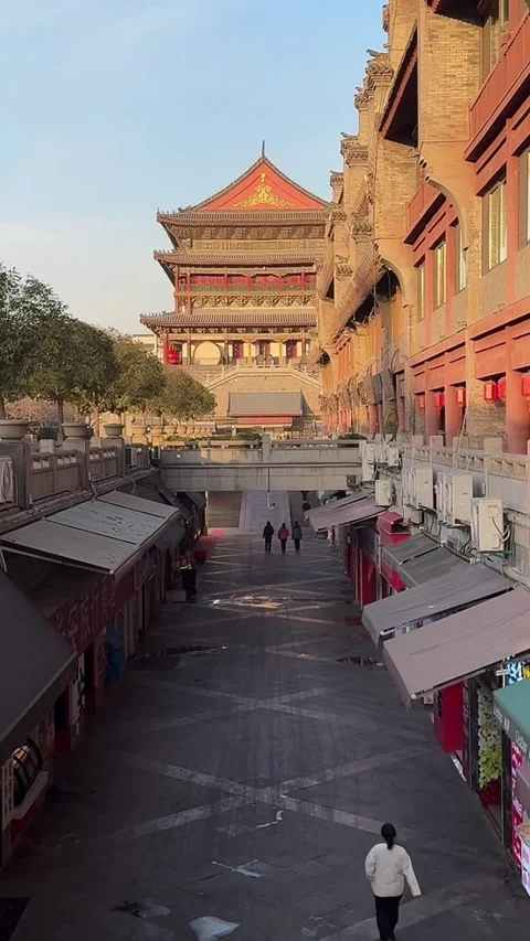 Timelapse Sunset Glow on Ancient Xi'an Drum Tower Architecture Stock Footage 329338223