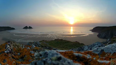 Timelapse of a sunset in holywell bay, cornwall, uk Stock Footage 35688106
