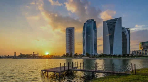 Timelapse Sunset at Jetty With 3 Buildings in the background Video stock 25670258