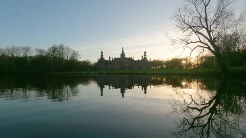 Timelapse of sunset by the lake with a castle Vídeos de archivo 170302268