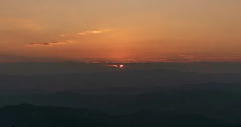 Timelapse Sunset mountain range beautiful landscape mist, dusk golden Stock Footage 267927178