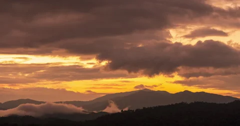 Timelapse Sunset mountain range beautiful landscape mist, dusk golden Stock Footage 276680504