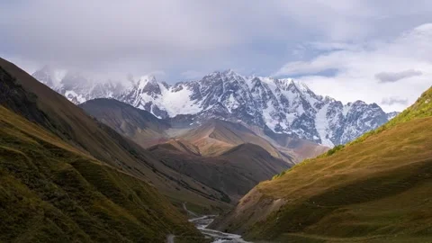 Timelapse of sunset at the mountain Shkhara, Caucasus Range, zoom out Stock Footage 252097997