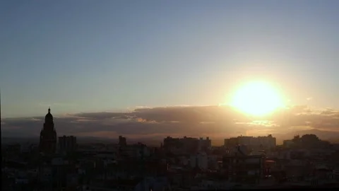 Timelapse of sunset in Murcia with the tower of the Cathedral in the background Stock Footage 243916167