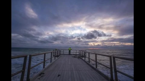Timelapse sunset to night of clouds on jetty at North Beach, Perth  Stock Footage 302654499