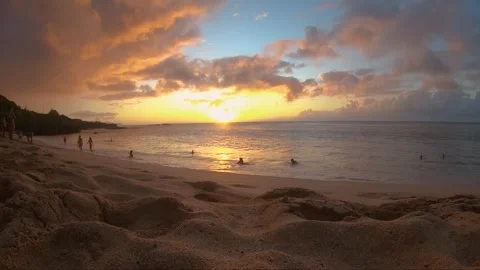 Timelapse Sunset on North Shore Beach, Oahu Hawaii with Waves and Moving Clouds Stock Footage 329234727