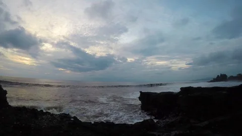 Timelapse in the sunset: ocean, sky and Tanah lot temple Stock Footage 88609933