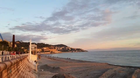 Timelapse of sunset over beach of Nice, France Stock Footage 72842518