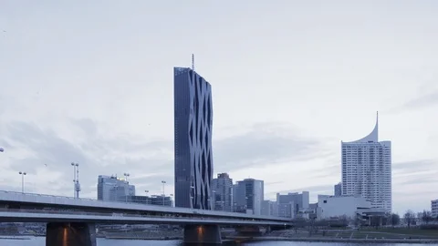 Timelapse of sunset over bridge crossing the Danube river Stock Footage 117167053