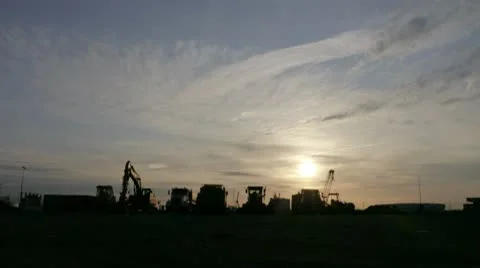 Timelapse sunset over construction vehicles 動画素材 10682715