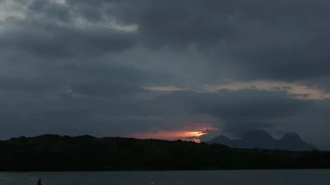 Timelapse of sunset over a lagoon, Macaé, Rio de Janeiro Stock Footage 317796320